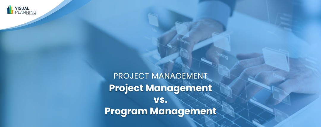 Man and woman planning on whiteboard | Project management vs. program management